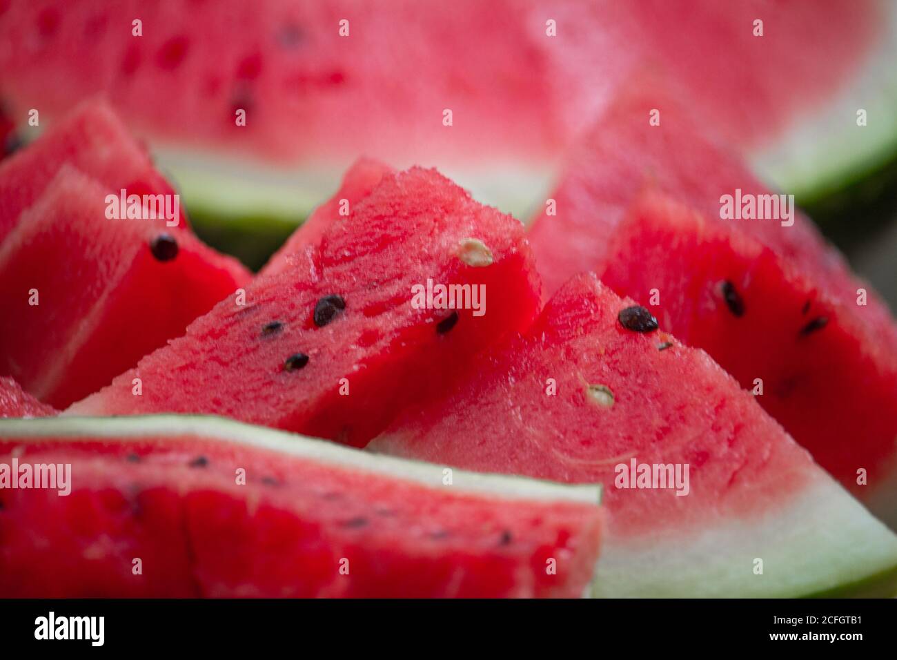 Fresh red watermelon on wooden cutting board, picnic concept, selective focus Stock Photo