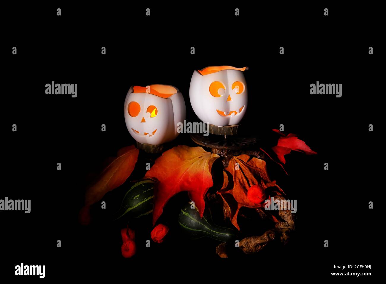 Two creepy pumpkins in the night Stock Photo