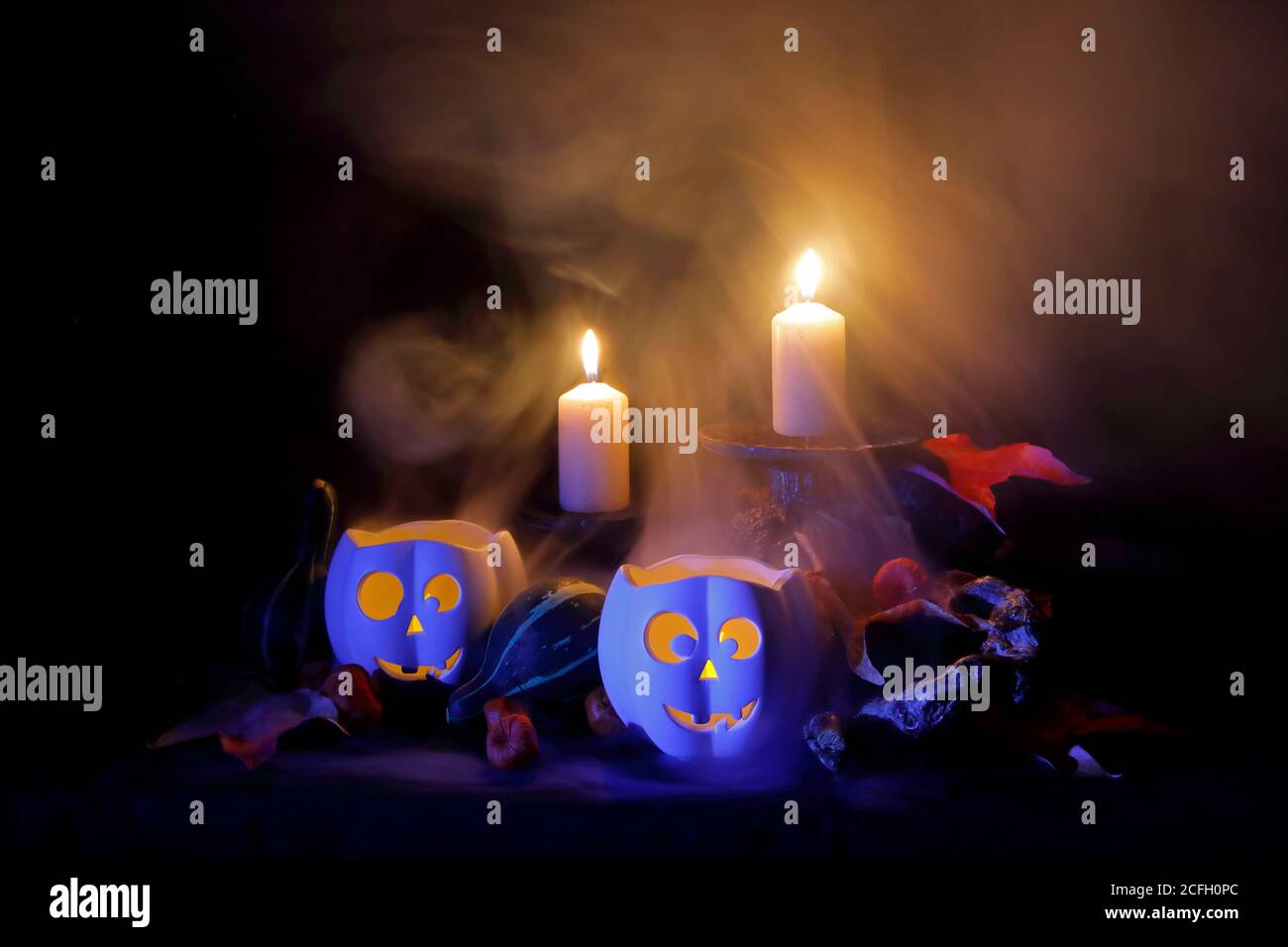 Two creepy pumpkins in the night Stock Photo