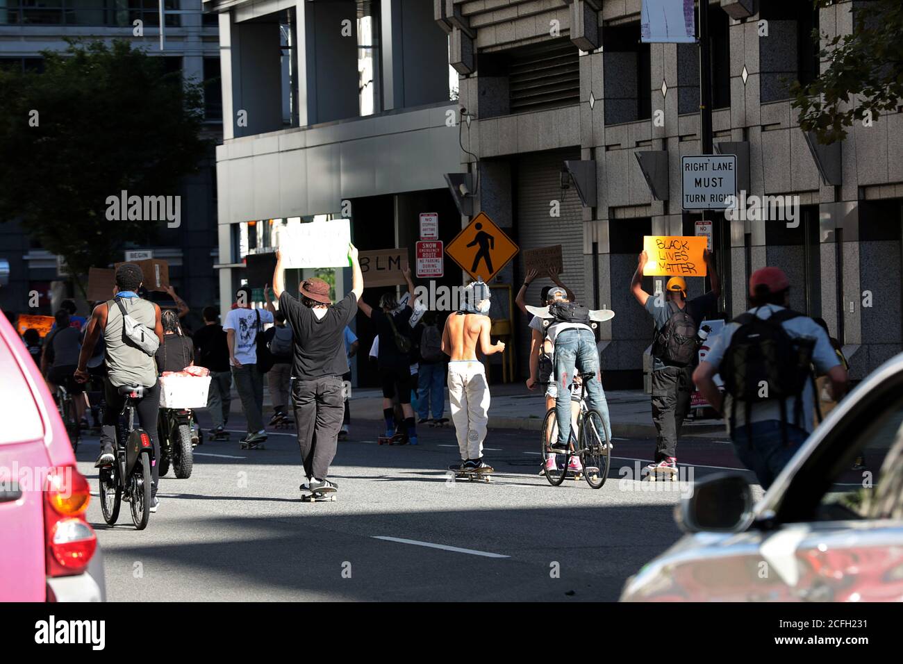 Protesters block traffic riding skateboards and bicycles downtown in Washington, U.S., September 5, 2020. REUTERS/Cheriss May Stock Photo
