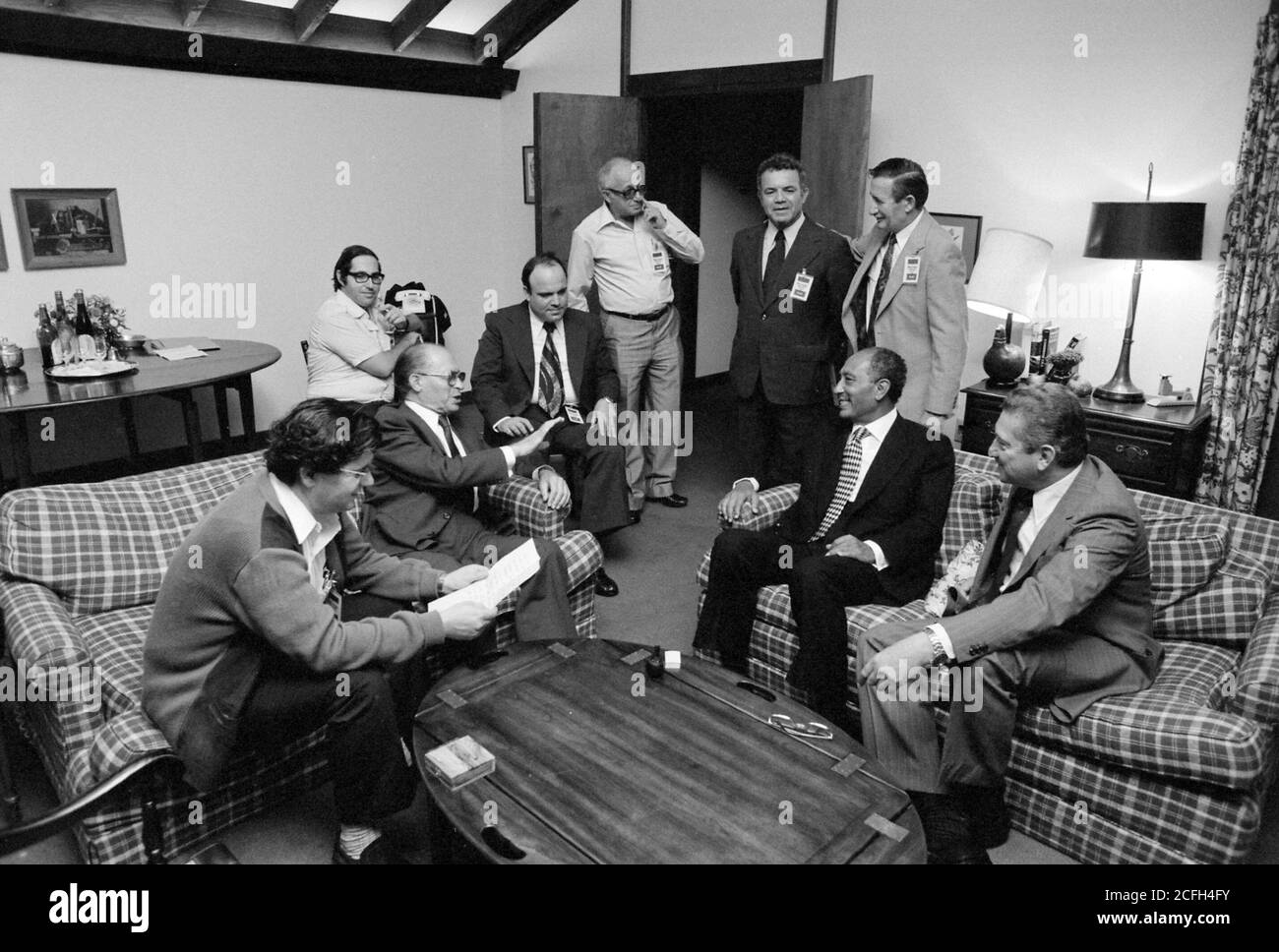 Menahem Begin and Anwar Sadat with members of the Israeli and Egyptian delegation at Camp David. ca.  09/17/1978 Stock Photo