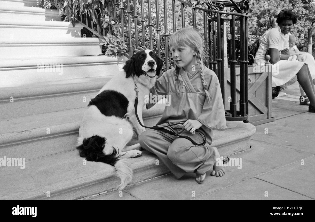 Amy Carter with her dog Grits ca.  9 June 1977 Stock Photo