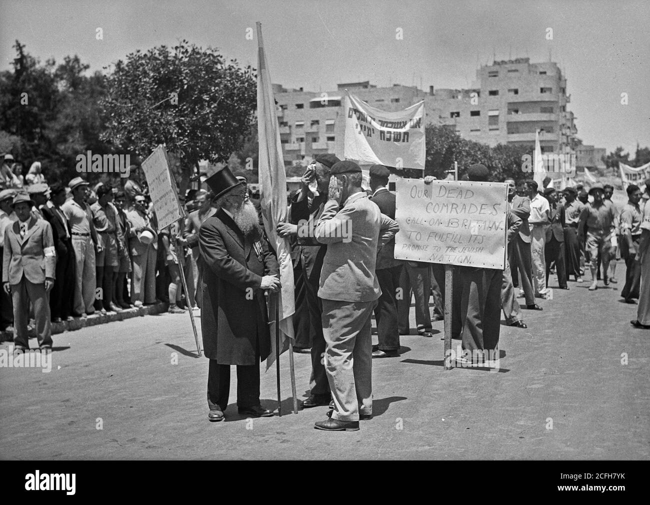 Middle East History - Jewish protest demonstrations against Palestine White Paper May 18 1939. Great War legionaries with their veteran chaplain parading on King George Ave. carrying appropriate slogans [Jerusalem] Stock Photo