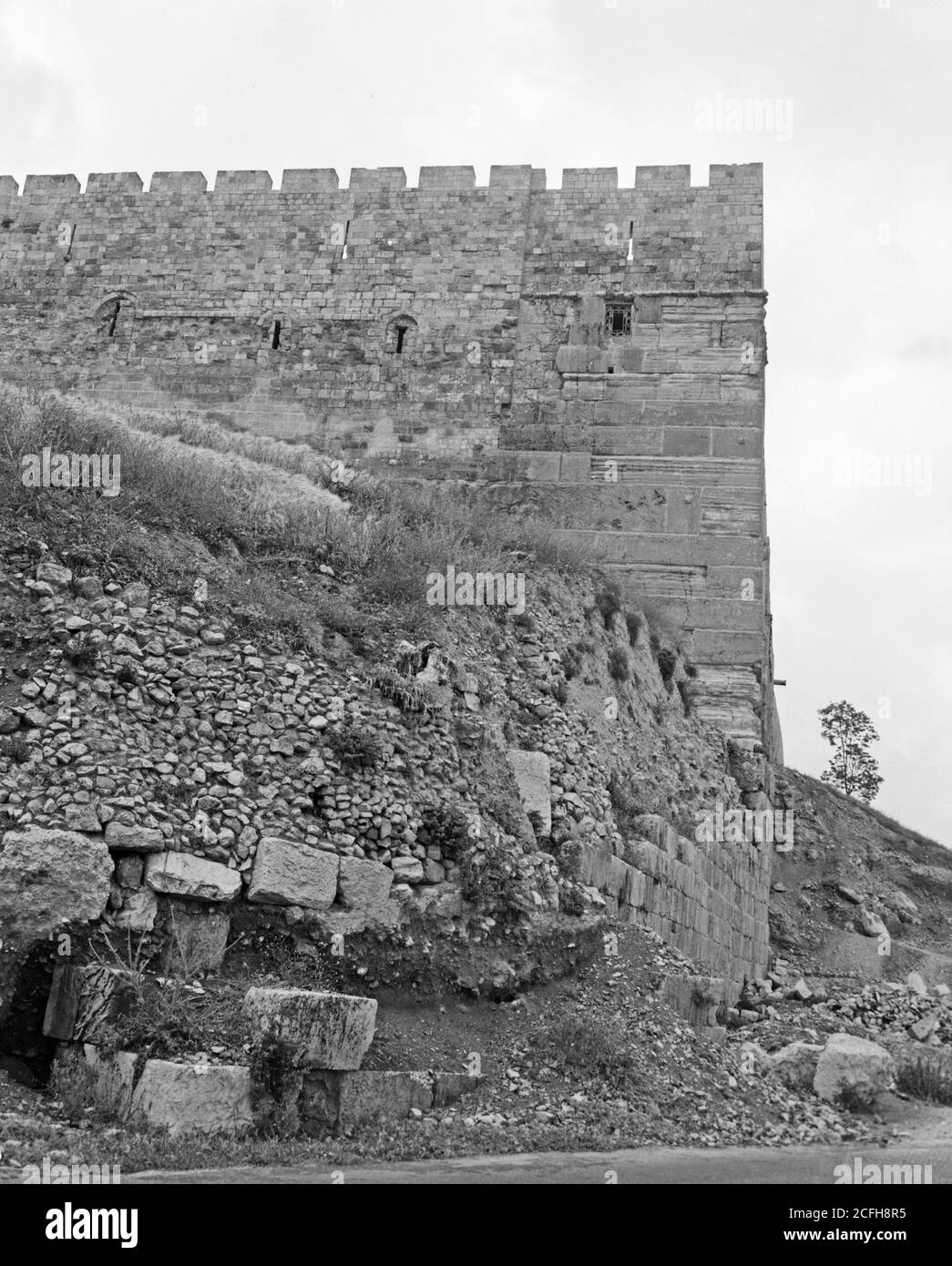 Original Caption S.E. corner of city wall after excavation in 1961