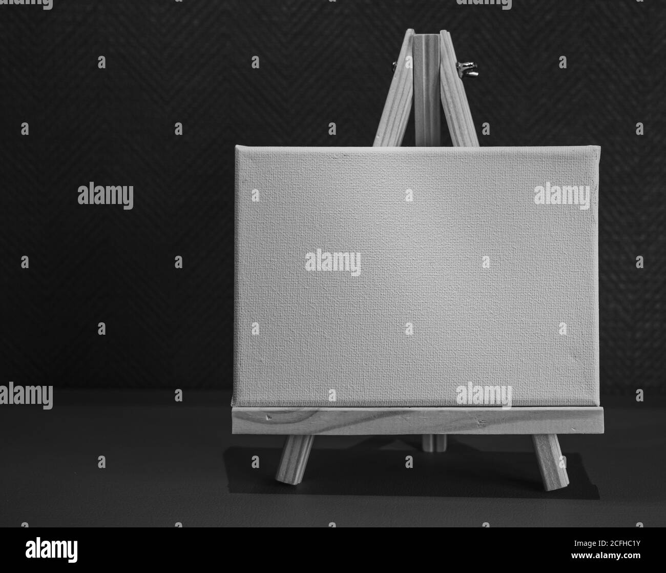Drawing pencils with wooden easel; Black and white style Stock Photo ...