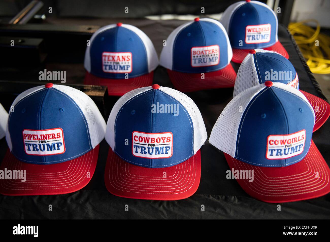 Lakeway, Texas USA Sept. 5, 2020: Novelty pro-Trump hats on sale at a mariner at the starting point of a boat parade supporting the U.S. president that attracted hundreds of watercraft of all sizes. The hats read 'Boaters for Trump' and 'Cowboys for Trump.' Several boats capsized in the huge wakes from hundreds of boats but no injuries were reported. Credit: Bob Daemmrich/Alamy Live News Stock Photo
