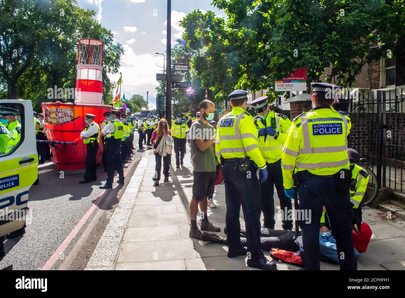 KENNINGTON, LONDON/ENGLAND - 5 September 2020: Extinction Rebellion protester being arrested during the “Lightship Greta” protest Stock Photo