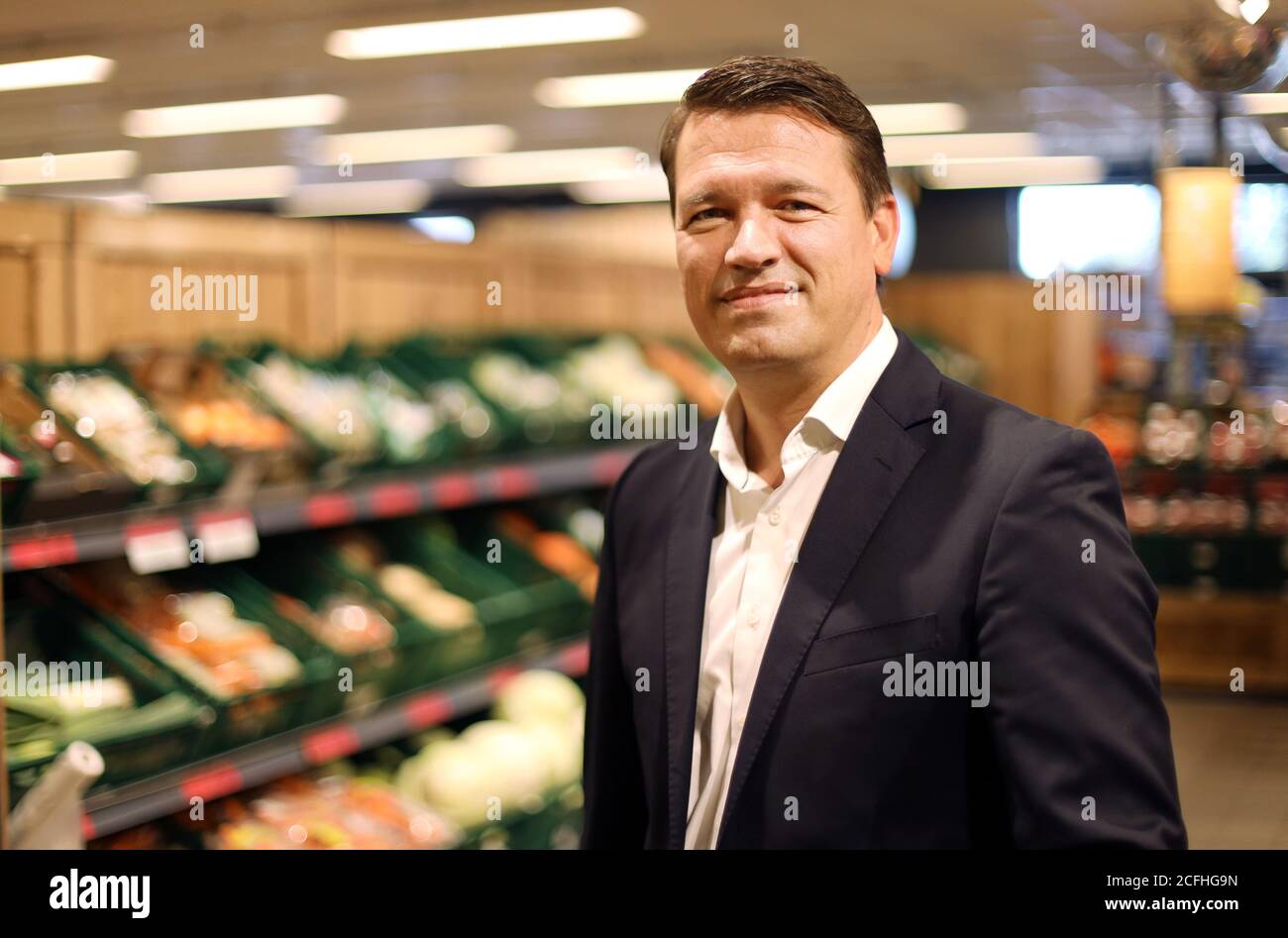 03 September 2020, Mecklenburg-Western Pomerania, Malchin: Managing Director Ingo Panknin of the retail chain Netto ApS & Co. KG stands in a Netto branch. The first branch opened 30 years ago in Vorpommern. In the meantime, the company is one of the largest in northeastern Germany with around 6000 employees. So far, the discounter has been represented 112 times in Mecklenburg-Western Pomerania alone, 143 times in Berlin and Brandenburg as well as in Saxony, Saxony-Anhalt, Lower Saxony, Hamburg and Schleswig-Holstein. (to dpa 'Only MV retail chain wants to grow - Corona crisis brings plus') Pho Stock Photo
