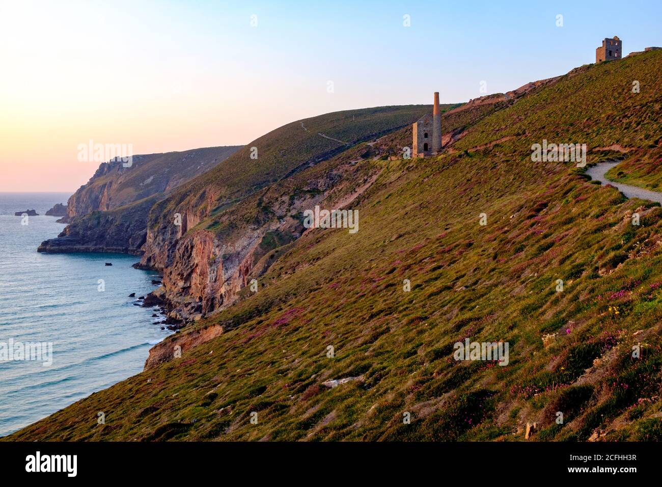 View north from the cliff above Chapel Porth towards the historic Wheal Coates pump engine house, Cornwall, England, United Kingdom Stock Photo
