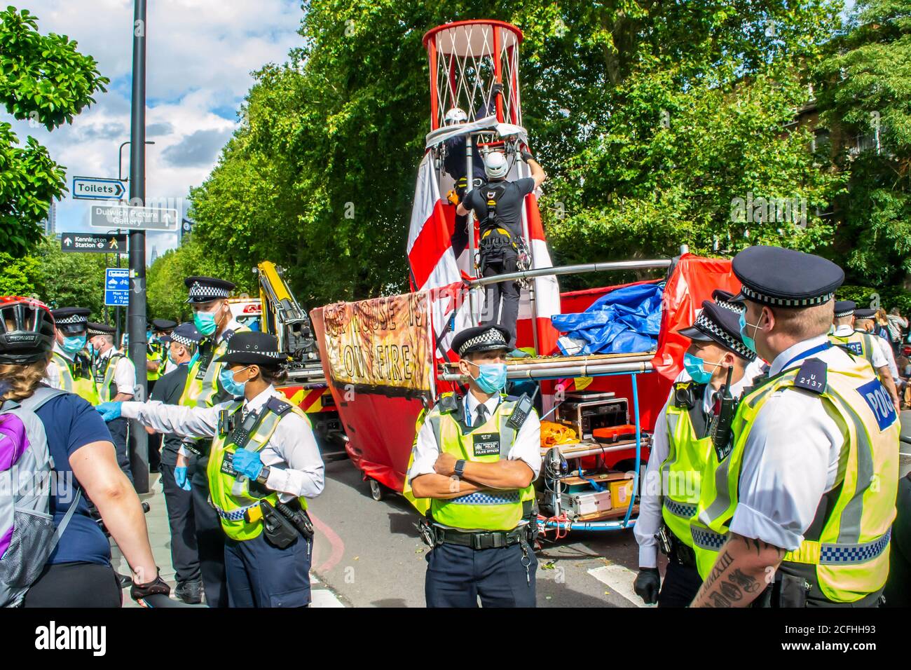 KENNINGTON, LONDON/ENGLAND - 5 September 2020: Extinction Rebellion's “Lightship Greta” boat being dismantled by police on Kennington Park Road Stock Photo