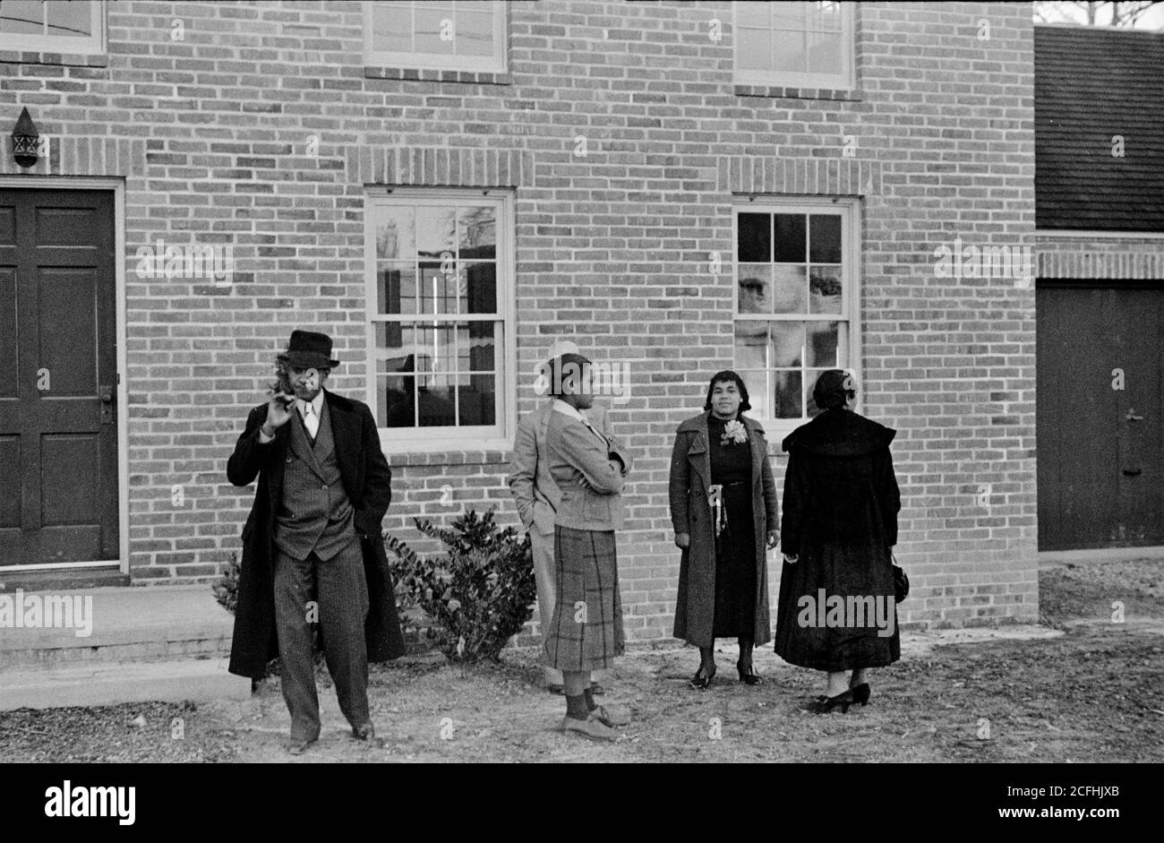 Neighbors Congregate Outside A New Home In A New Deal Housing