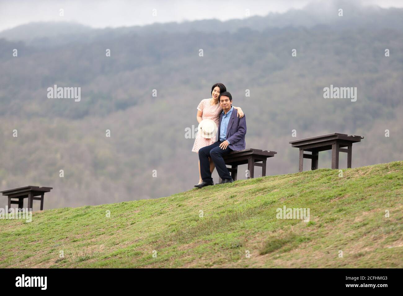 Asian middle aged man enjoy hi-res stock photography and images - Alamy
