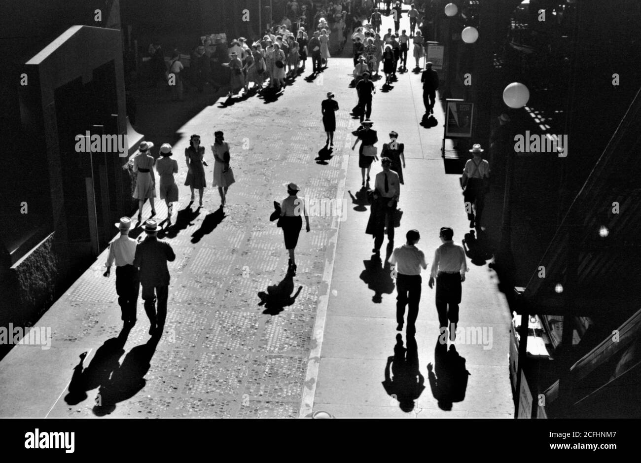 Five o'clock Shadows Crowds in the street at five o'clock in the