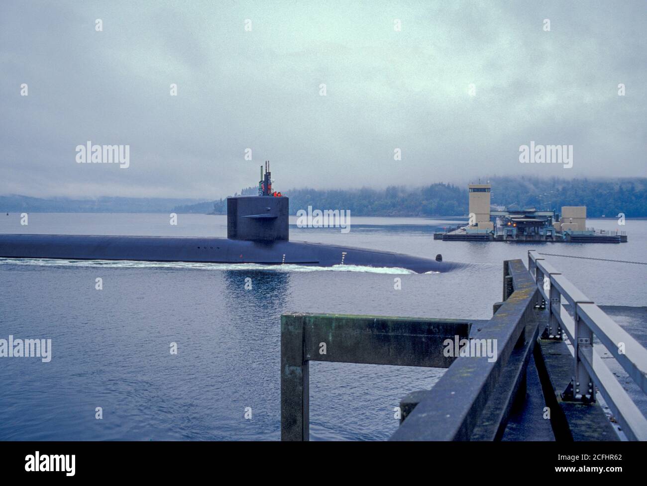 US Navy nuclear submarine passes through the Hood Canal drawbridge, Kitsap County, Washington USA Stock Photo