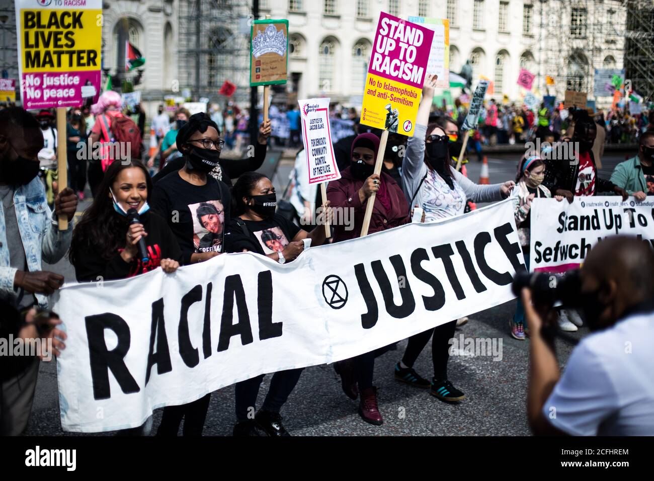 United Kingdom: Cardiff, Wales. Protesters gather and rally for justice and a change in government system at a BLM rally. Stock Photo