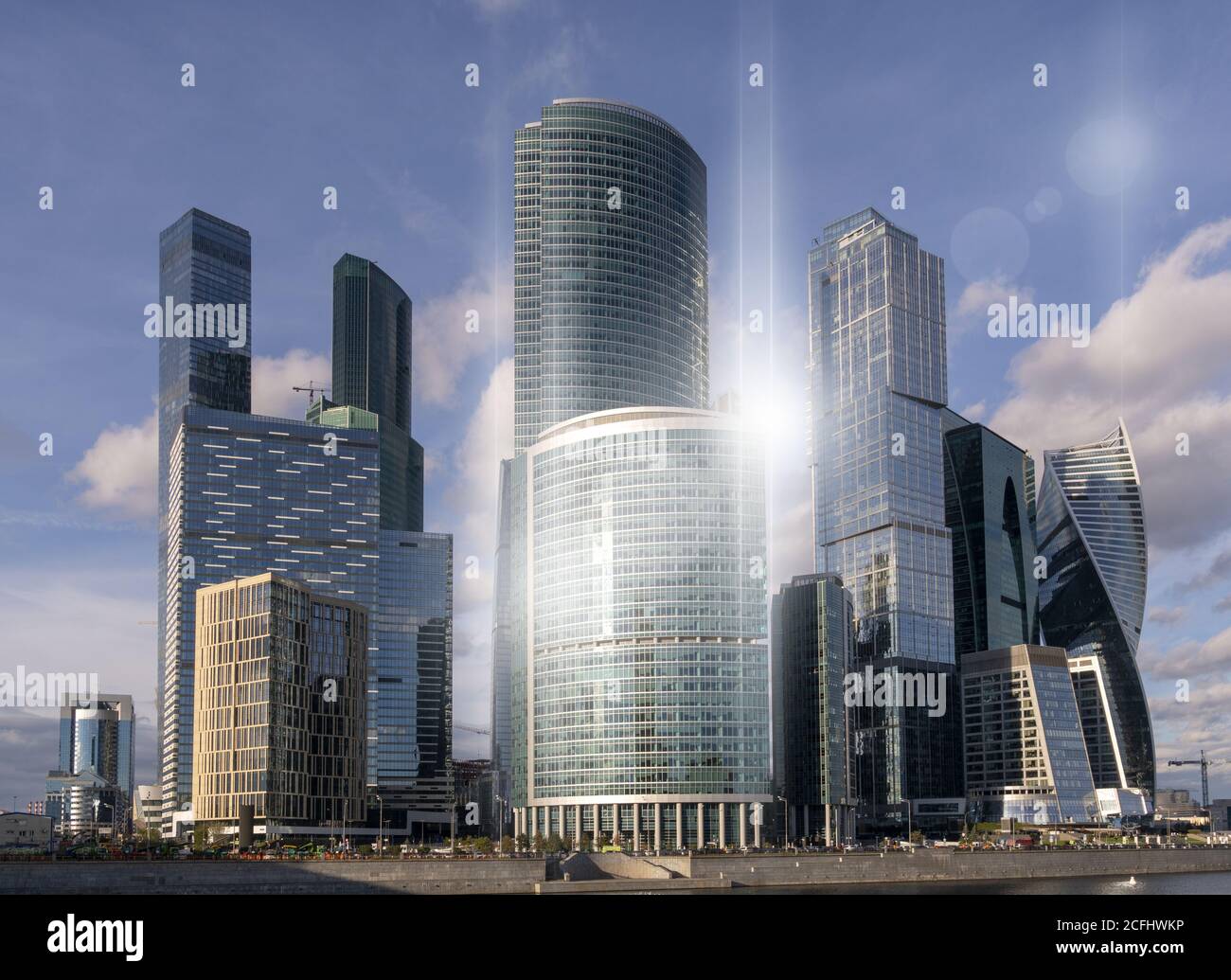 Modern skyscrapers under the cloudy sky Stock Photo - Alamy