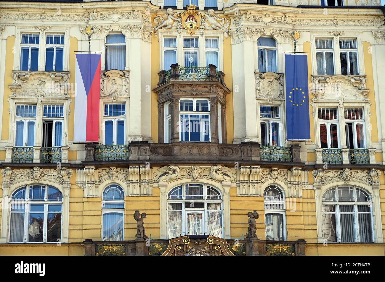 an old building with a Czech and European Union flag in Prague Stock Photo