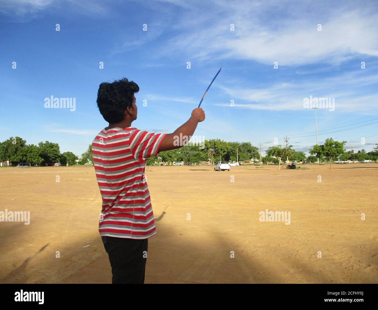 wooden boomerang making and throw Stock Photo Alamy