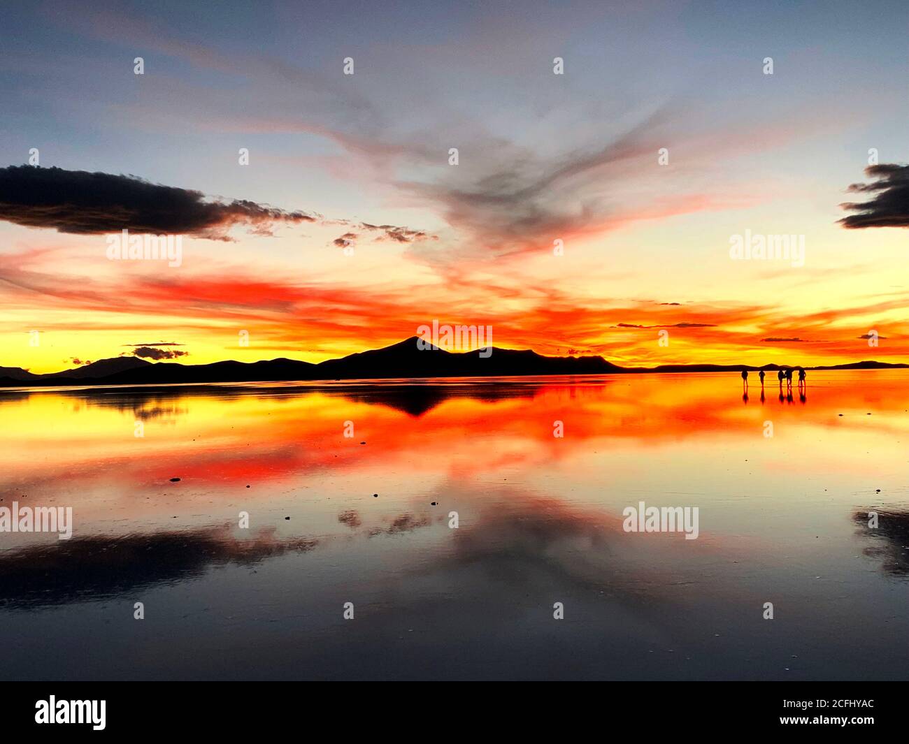 Spectacular Sunset Over Salt Flats Of Salar De Uyuni Bolivia Magical Sky Reflection In The Water Impressive Wilderness Nature Of South America 2CFHYAC 