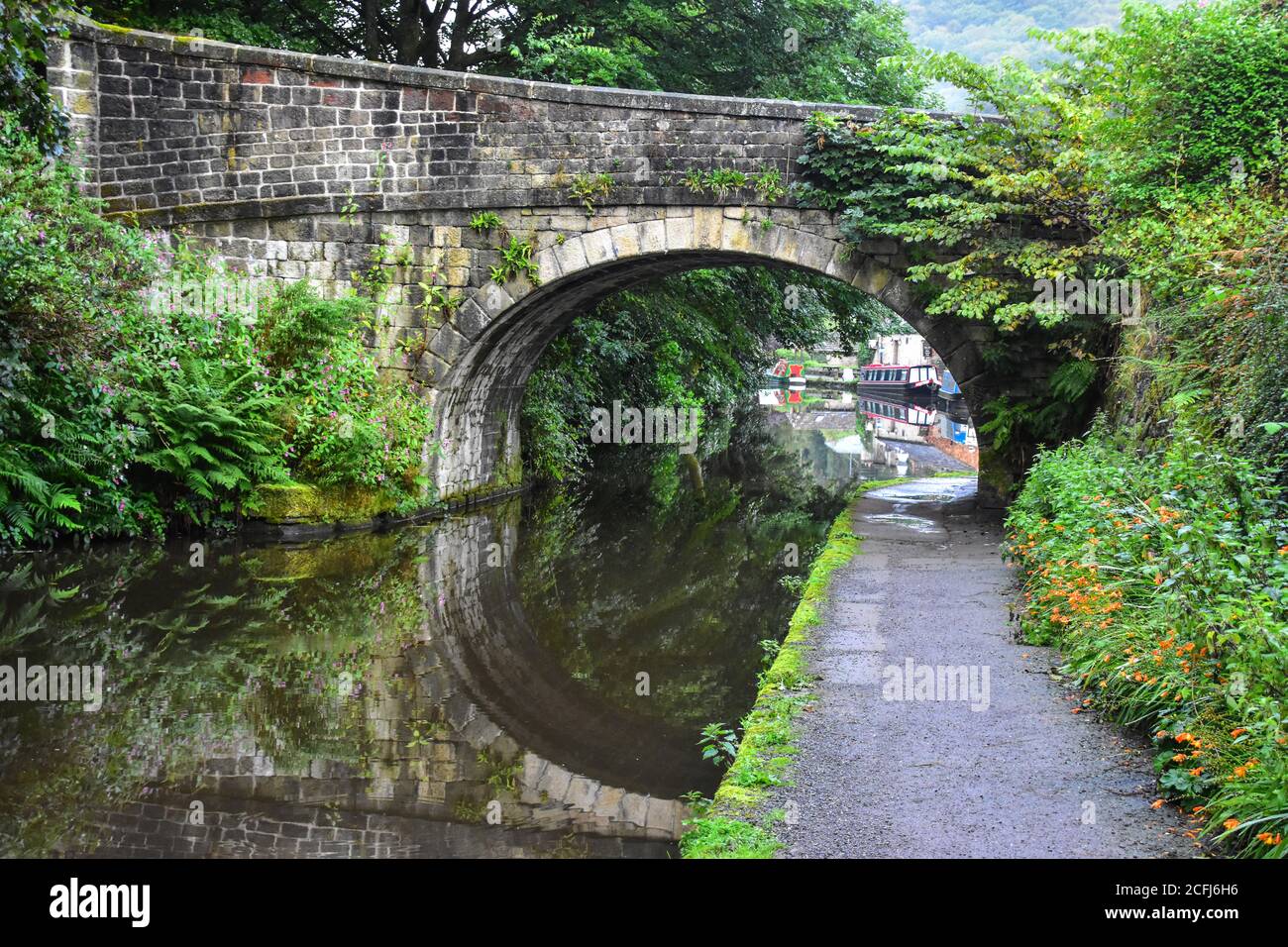 Reflections in the Rochdale Canal, Stubbing Wharf, Hebden Bridge, Pennines, Yorkshire, UK Stock Photo