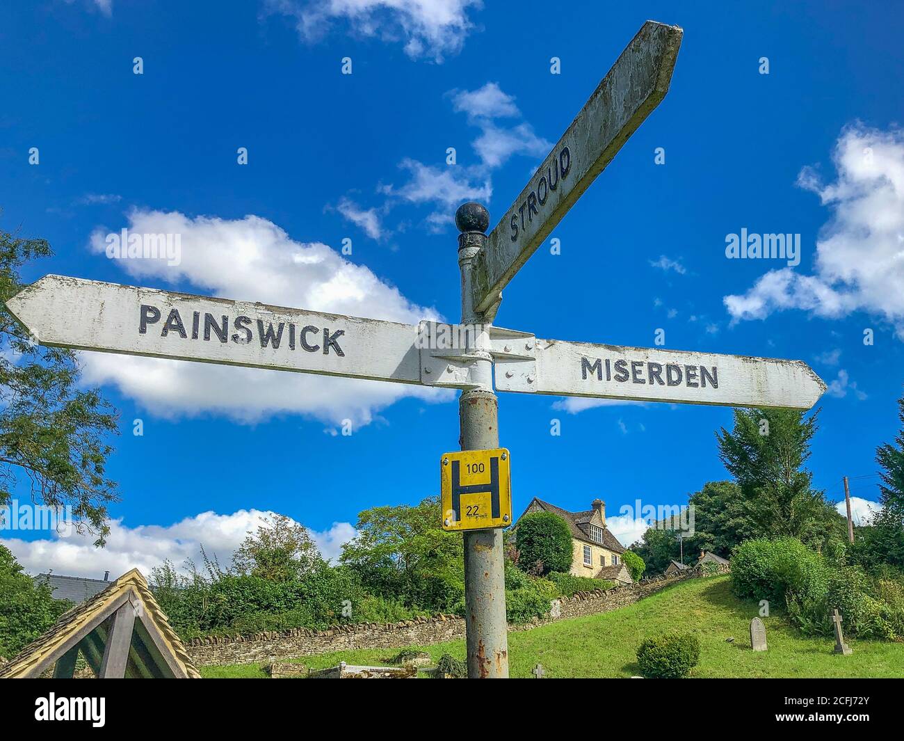 Signpost in the Cotswold village of Sheepscombe Stock Photo