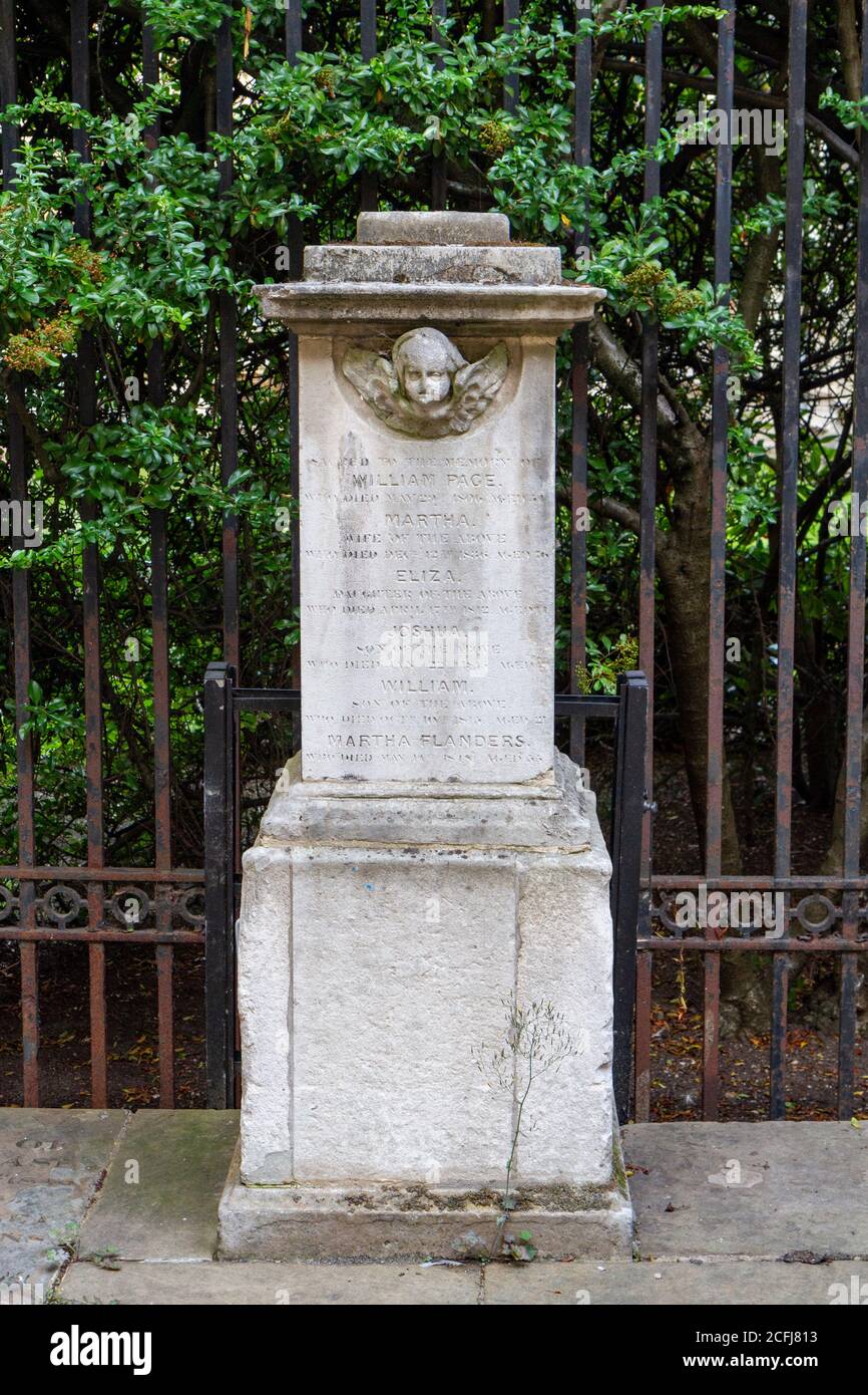 headstone at the entrance to the Michaelhouse Centre, Trinity Street,  Cambridge, Cambridgeshire, UK. Stock Photo