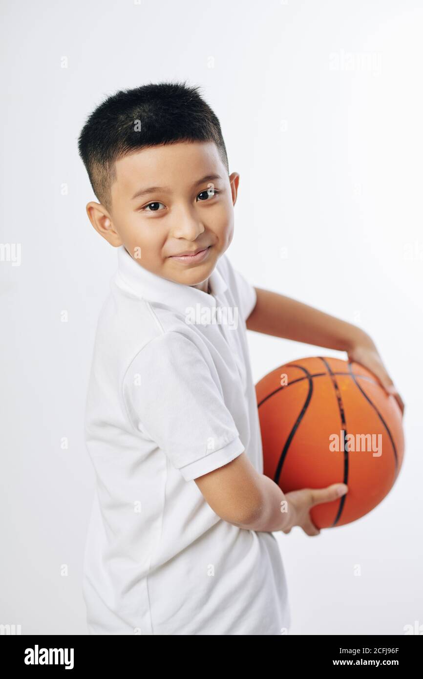 Boy with basketball ball Stock Photo Alamy