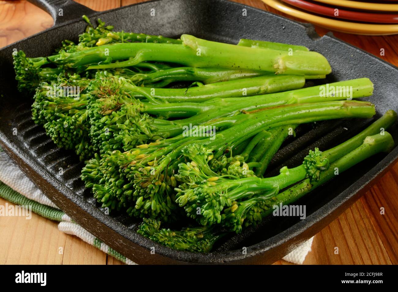 Grilled broccoli spears in a cast iron skillet Stock Photo Alamy