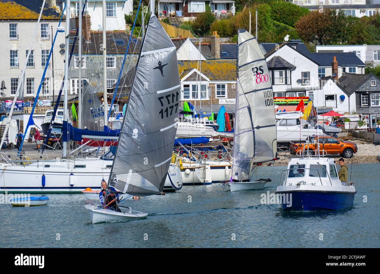Lyme Regis, Dorset, UK. 6th Sep, 2020. UK Weather: Sailing boats set off from Lyme Regis harbour for a morning of sailing in and around Lyme Bay on a cloudy morning with some warm sunny spells. Credit: Celia McMahon/Alamy Live News Stock Photo