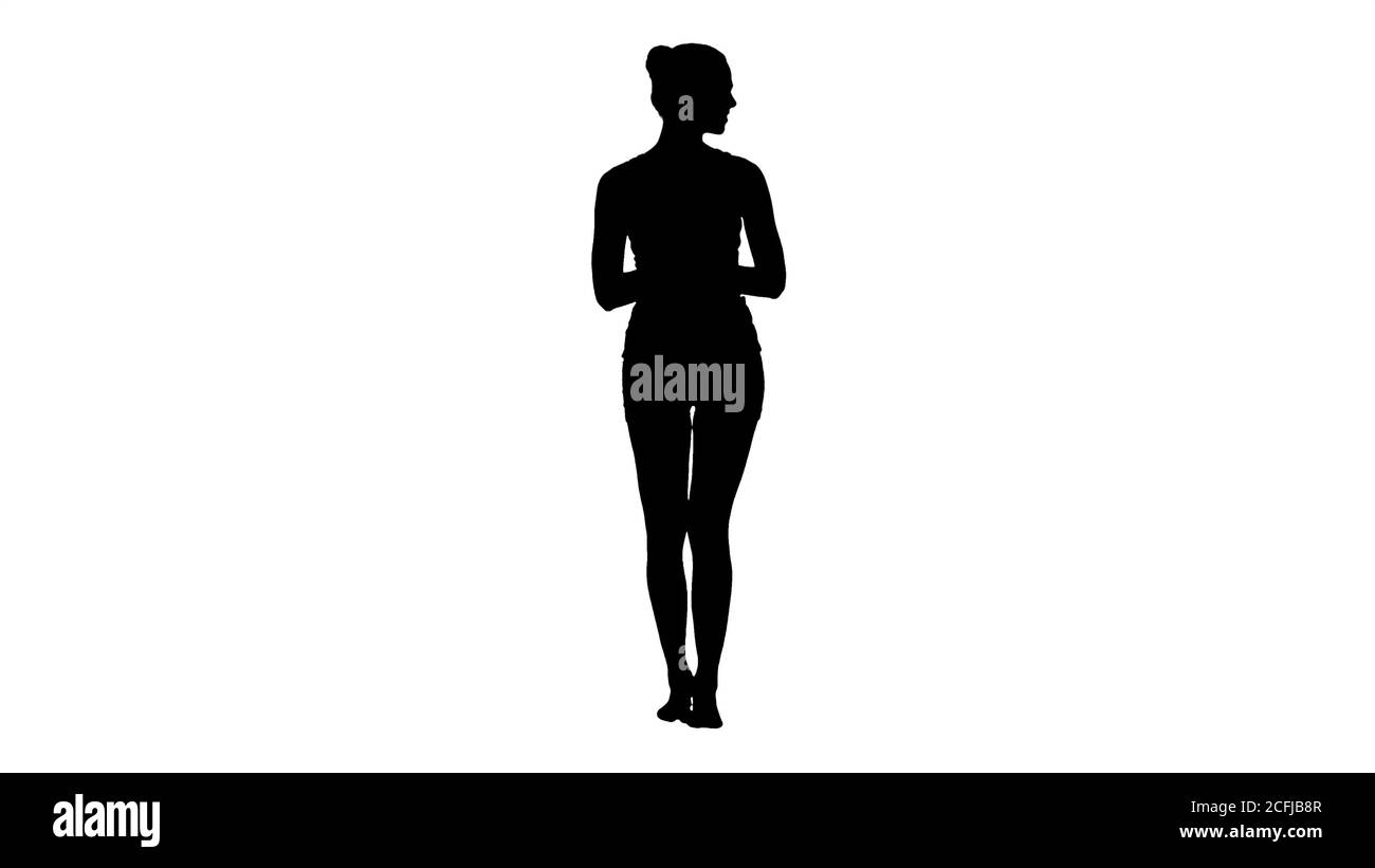 Silhouette Woman walking and drinking coffee Stock Photo - Alamy