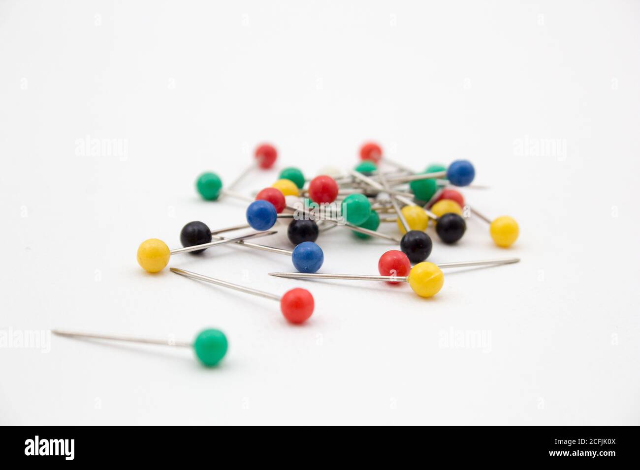 Pile of pins with colorful ball heads Stock Photo - Alamy