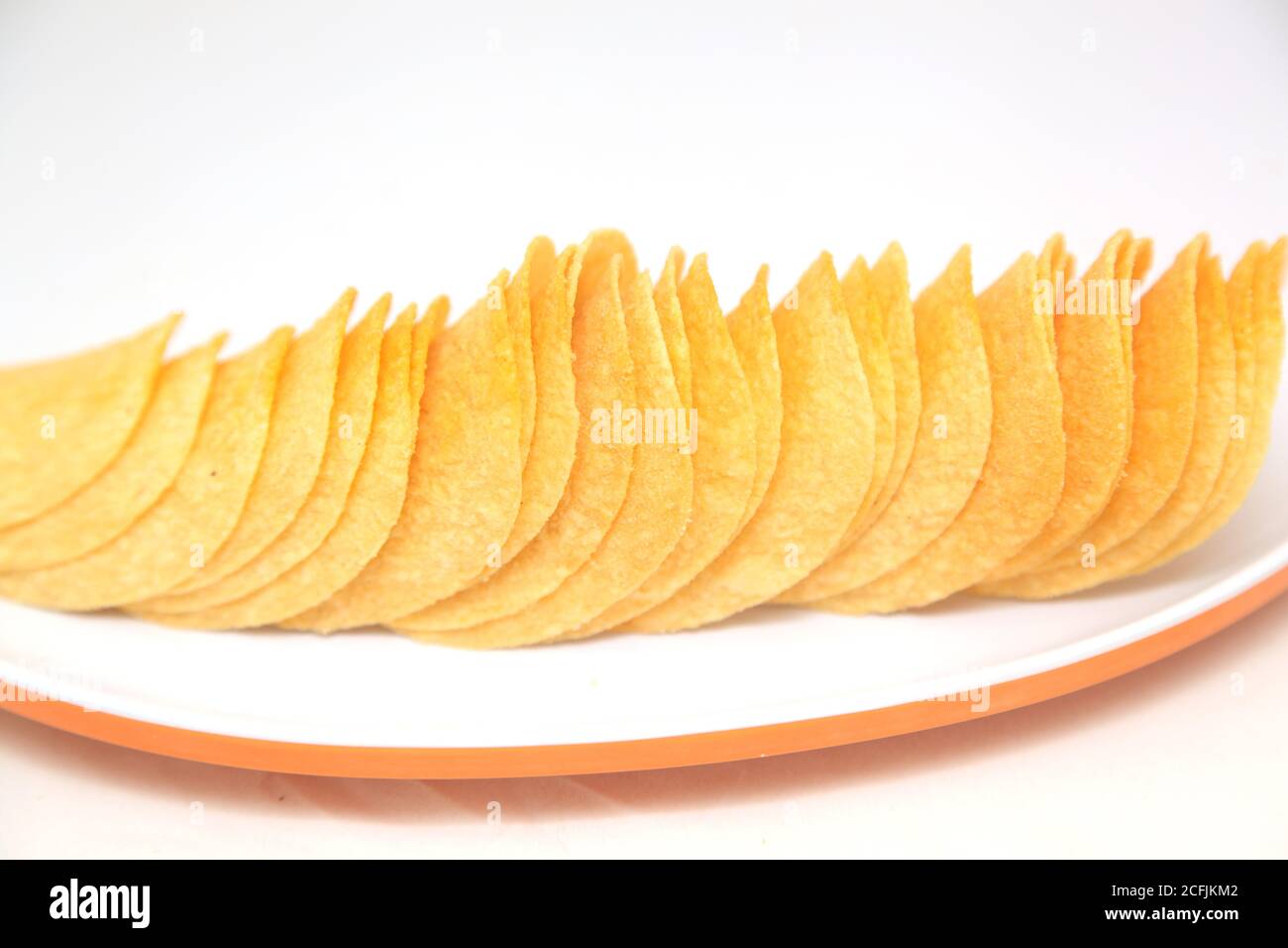 potato chips in plates Stock Photo