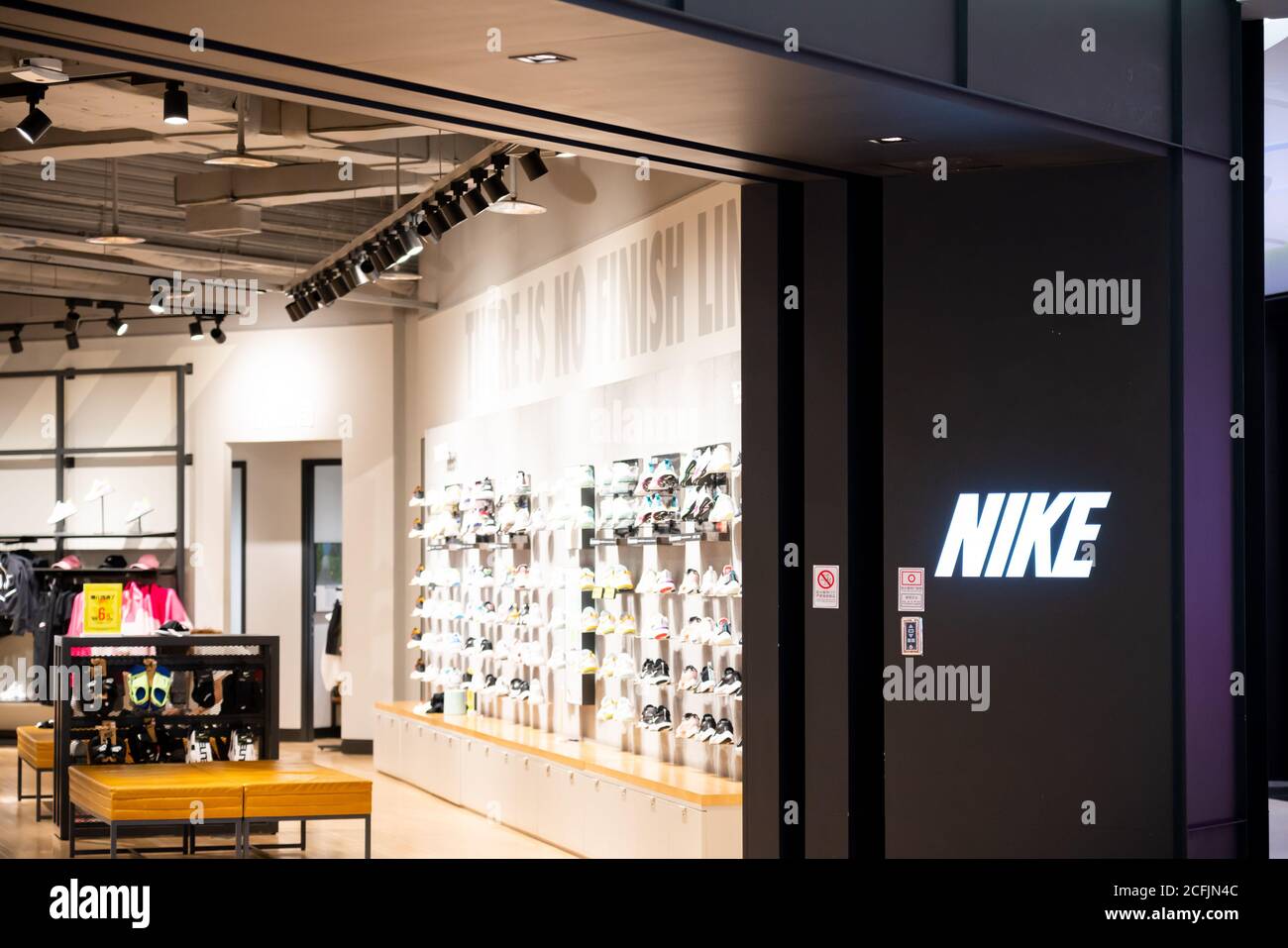 American multinational sportswear manufacturer Nike store and logo seen in  Chongqing Stock Photo - Alamy