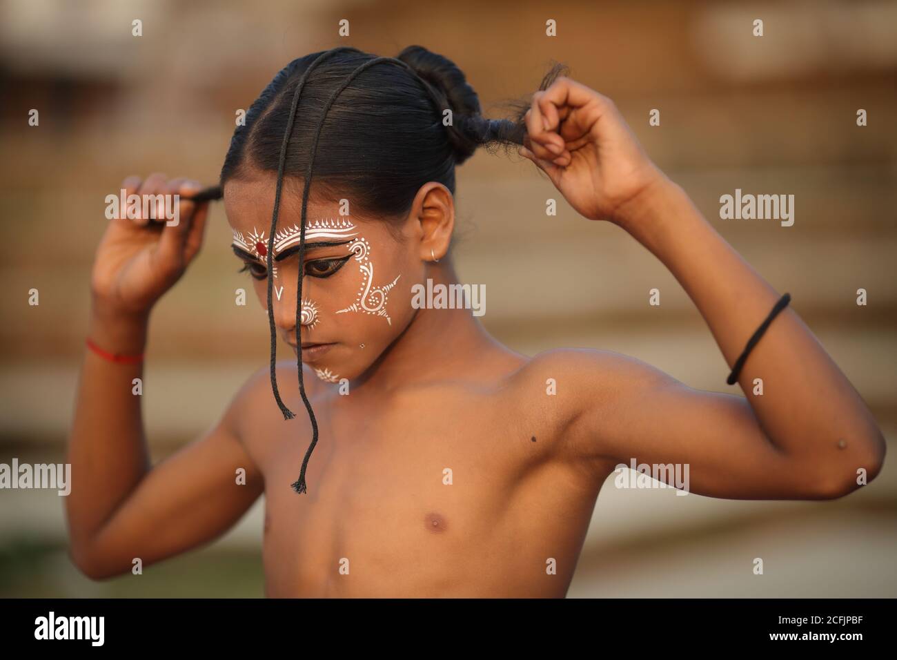 Young Gotipua dancer in the traditional heritage crafts village Raghurajpur near Puri, Odisha, India Stock Photo