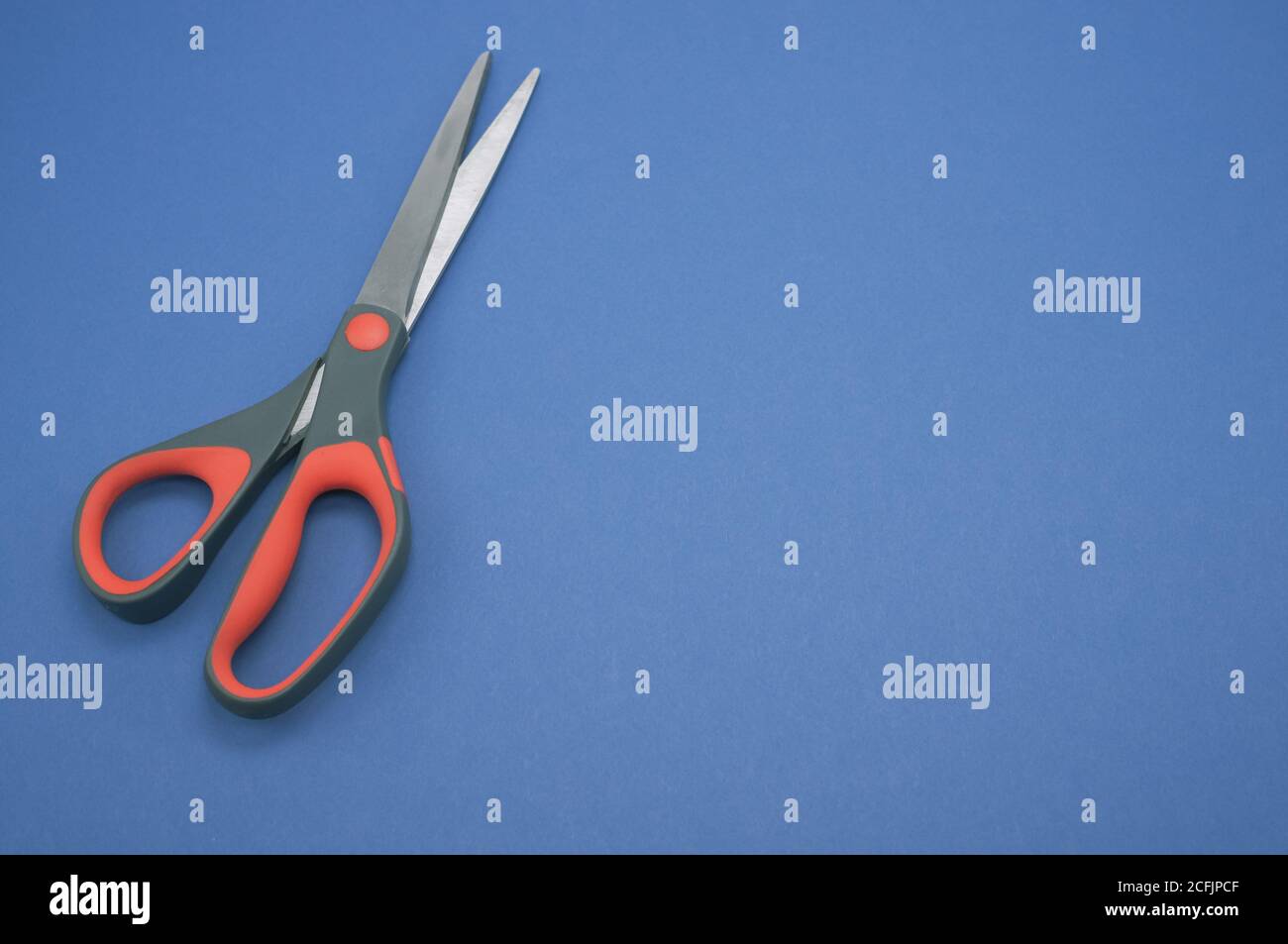 Scissors Top View Top view of scissors isolated on a blue background Stock Photo - Alamy