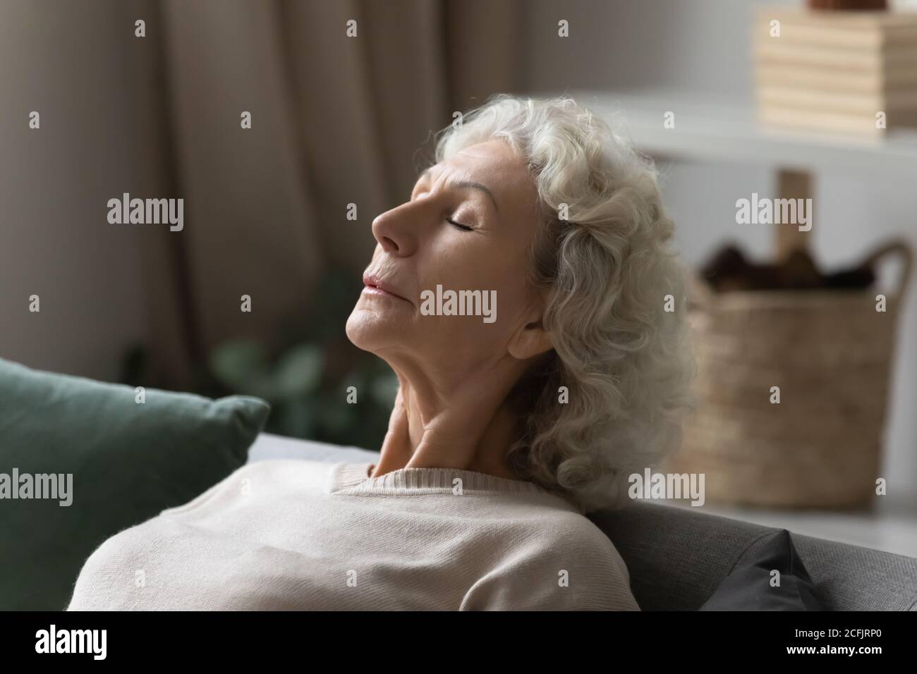 Close up calm peaceful mature woman relaxing with closed eyes Stock ...