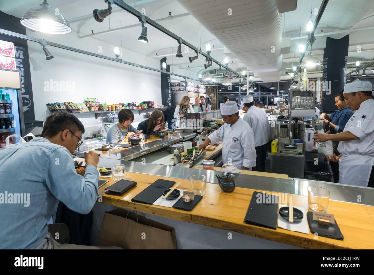 Chelsea Market, New York City 18th May 2016 People eating at a