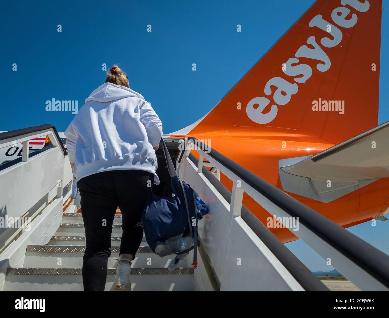 Air passengers boarding a EasyJet flight in Aktion airport. Stock Photo