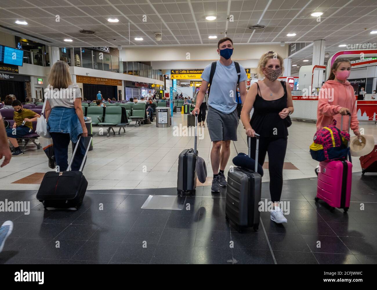 Airport wearing mask hires stock photography and images Alamy