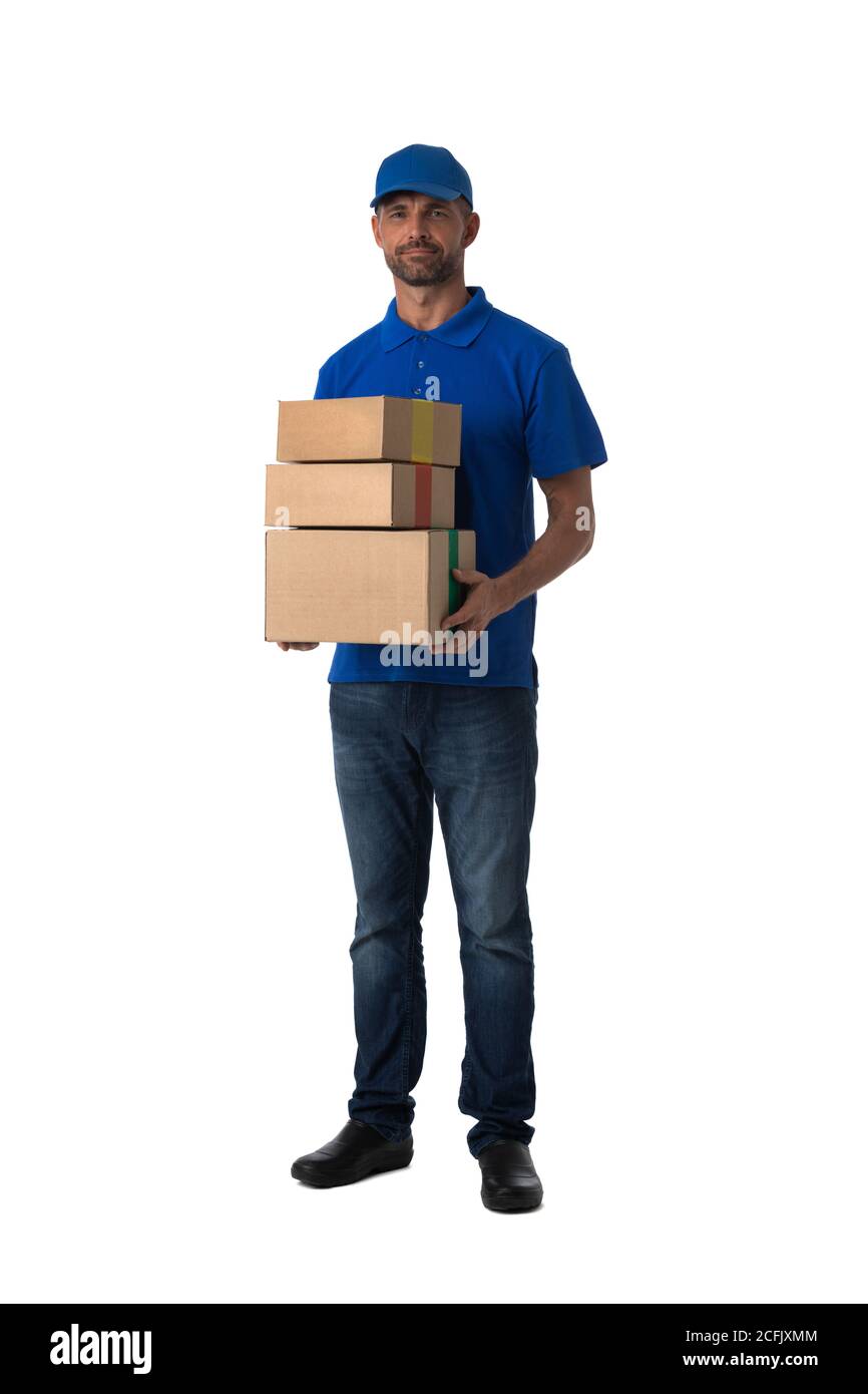 Handsome delivery man with stack of boxes isolated on white background, full length portrait Stock Photo