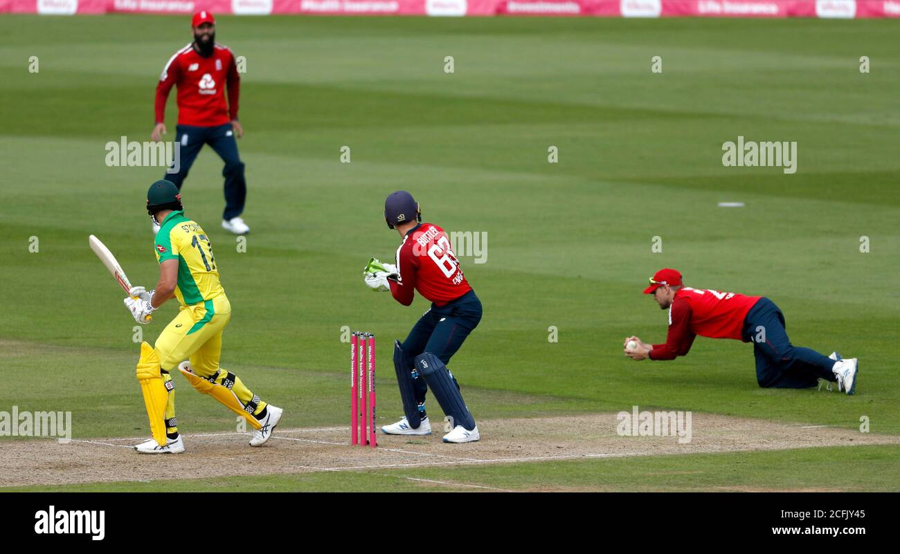 Malan Rashid Australia's Marcus Stoinis (left) is caught out by England's Dawid ...