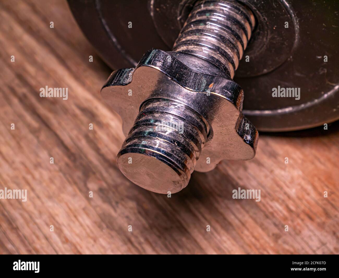 Iron bolt with thread and twisted nut Stock Photo Alamy