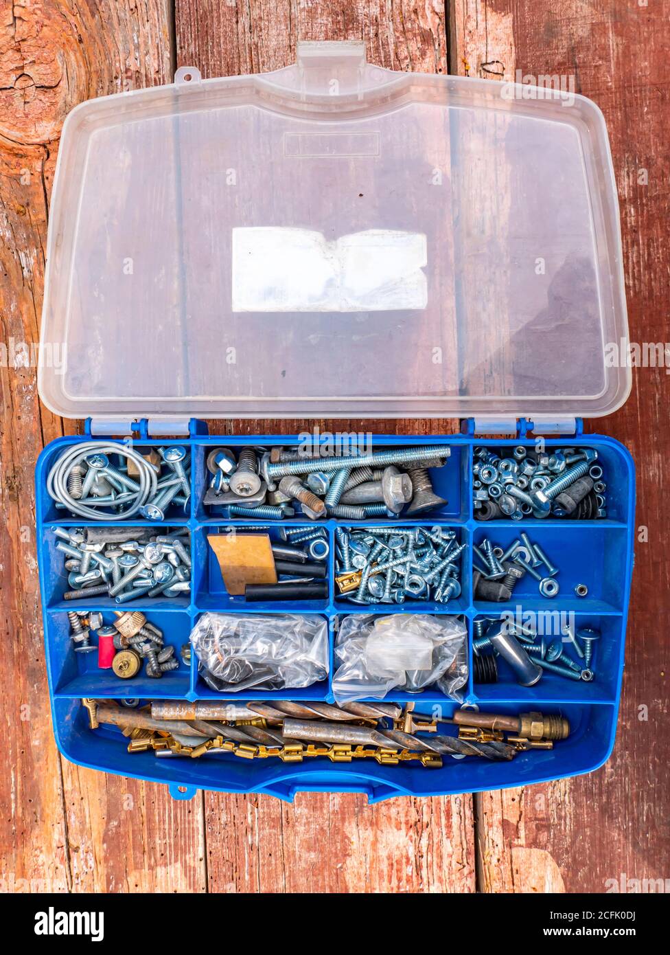 Working tool plastic case with bolts and nuts. Stock Photo