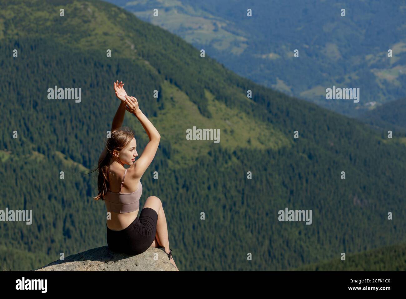 Girl Sitting On High Hill High Resolution Stock Photography and Images ...