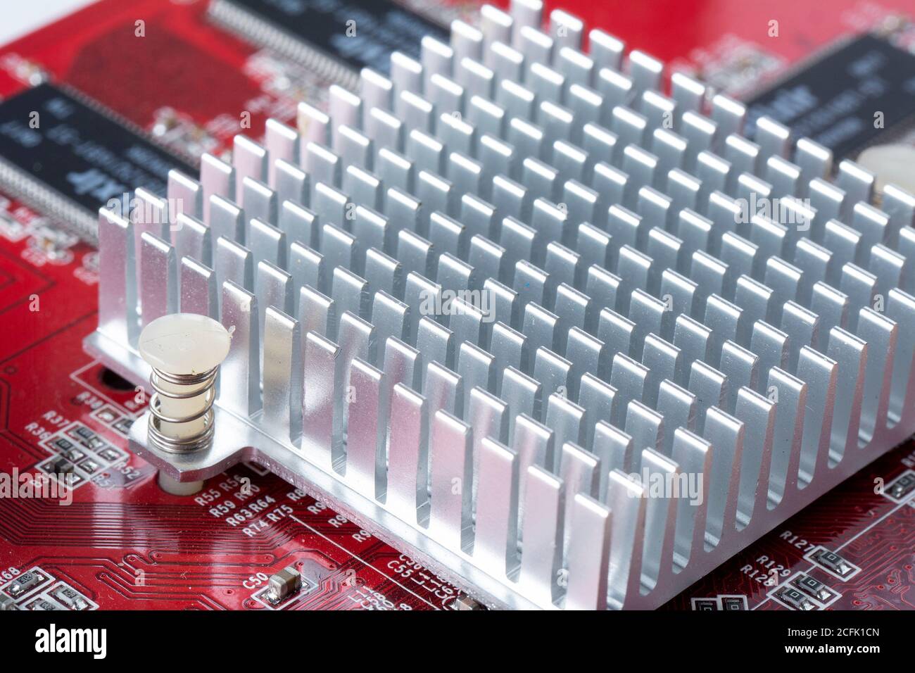 Disassembled video card, aluminum radiator on thermal paste