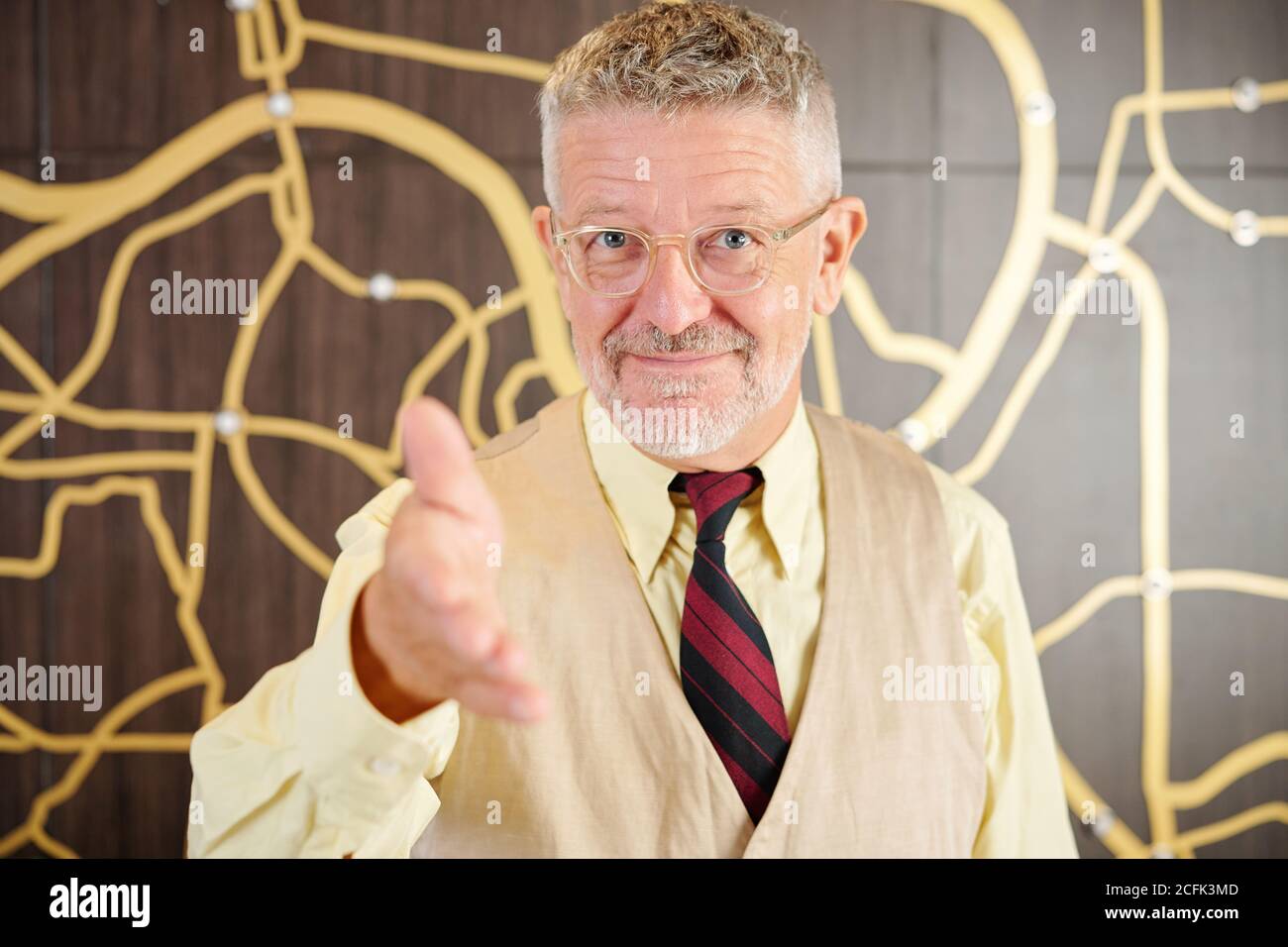 Man greeting business partner Stock Photo - Alamy