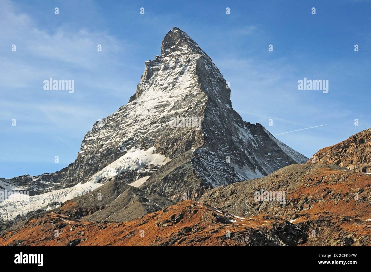 View of the Matterhorn from the Schwarzsee in autumn. Stock Photo