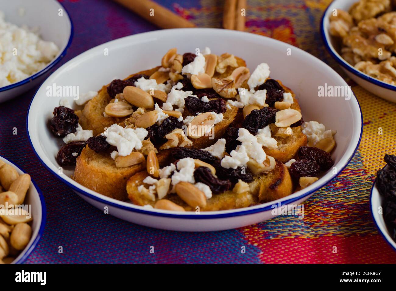 Capirotada side view, a traditional sweet food from Michoacan, Mexico Stock Photo