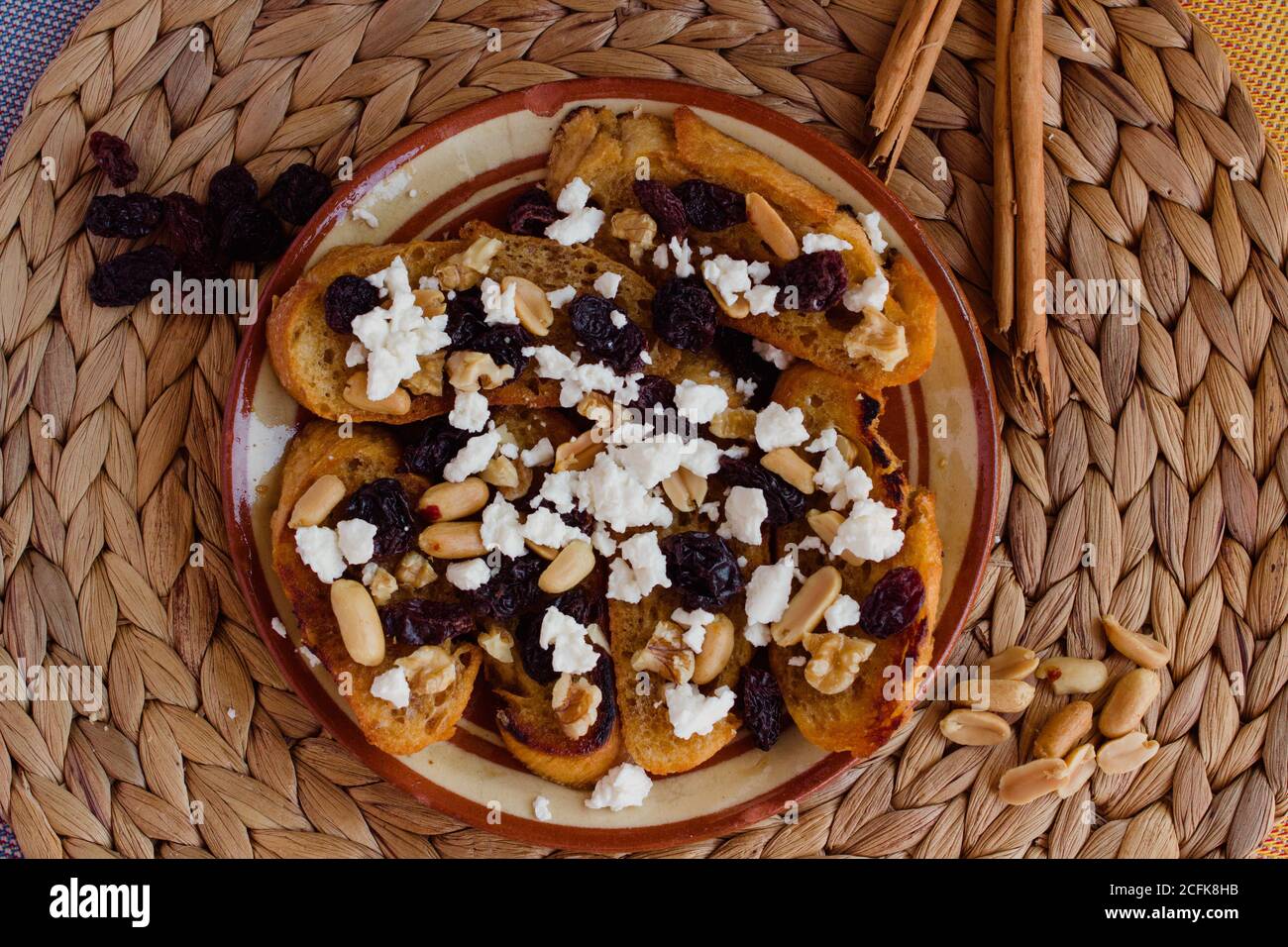 Capirotada flatlay view on a rustic background Stock Photo