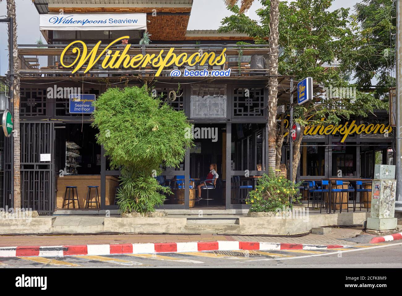 Witherspoons pub, Pattaya Beach Road, Thailand, Southeast Asia, a play on the name of the popular British Wetherspoons chain of pubs Stock Photo